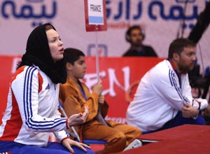 یک زن مربی تیم تکواندوی مردان است (+عکس) یک زن مربی تیم تکواندوی مردان است (+عکس)